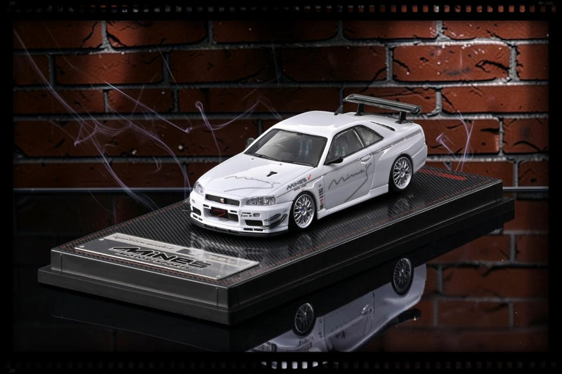 Chargez l'image dans la visionneuse de la galerie, NISSAN SKYLINE GT-R MINE'S (R34) BLANC IGNITION MODEL 1:64
