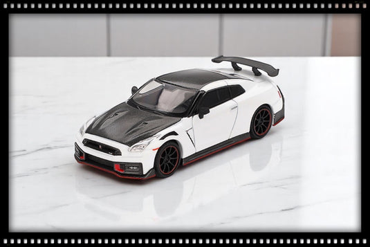 Nissan GTR (35) NISMO BLANC 2024 (LHD) MINI GT 1:64