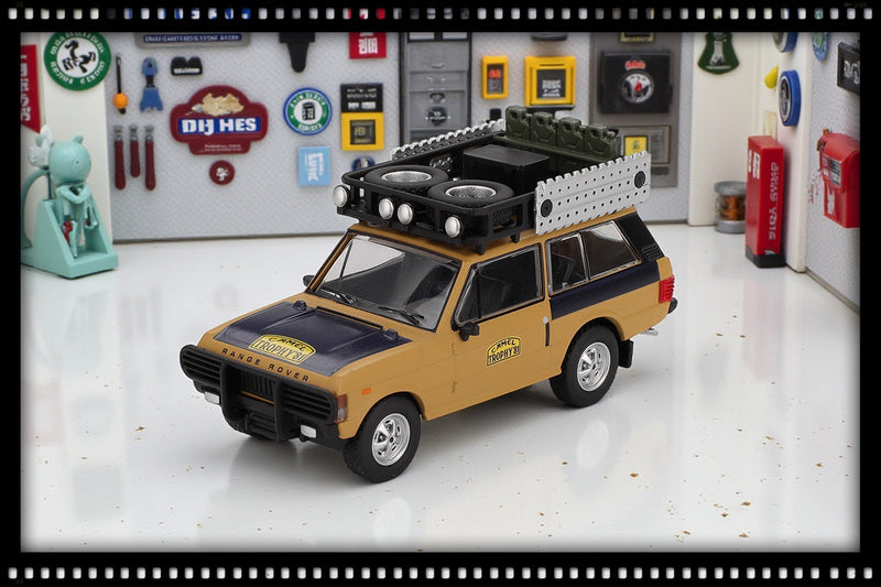 Load image into Gallery viewer, Land Rover RANGE ROVER C.SWOBODA &amp; K.MENTEL WINNER CAMEL TROPHY SUMATRA 1981 (LHD) MINI GT 1:64
