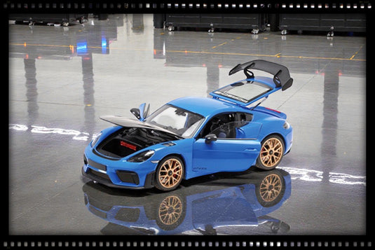 Porsche CAYMAN GT4 RS 2024 BLUE METTALIC GOLD WHEELS WITH WEISSACH PACKAGE MINICHAMPS 1:18
