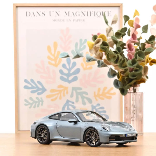 PORSCHE 911 CARRERA 2025 ARGENTÉ NOREV 1:18