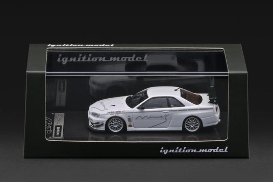 NISSAN SKYLINE GT-R MINE'S (R34) BLANC IGNITION MODEL 1:64