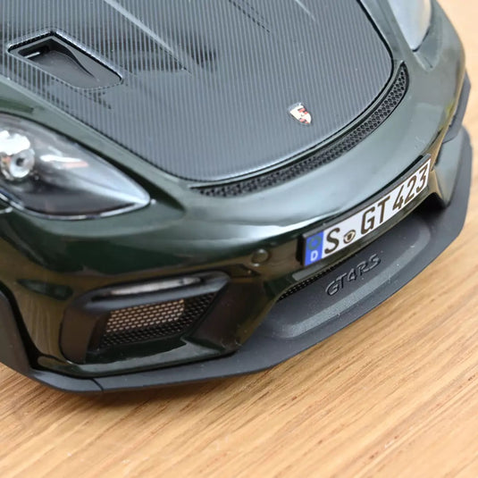 Porsche Cayman GT4 RS with pack Weissach 2023 Green NOREV 1:18
