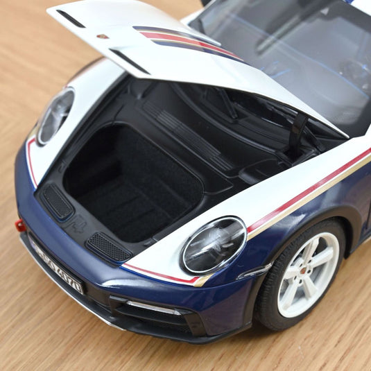 Porsche 911 Dakar 2023 Roughroads Blue/White/Gold/Red NOREV 1:18