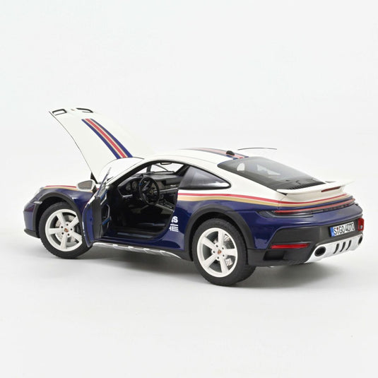 Porsche 911 Dakar 2023 Roughroads Blue/White/Gold/Red NOREV 1:18