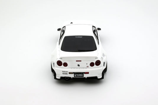 Nissan SKYLINE GT-R (BNR34) BY KRC PEARL WHITE QX1 2019 OTTOmobile 1:18