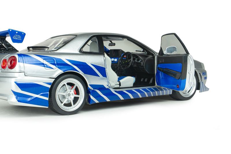 Load image into Gallery viewer, NISSAN SKYLINE GT-R (BNR34) 2FAST2FURIOUS BRIAN SOLIDO 1:18
