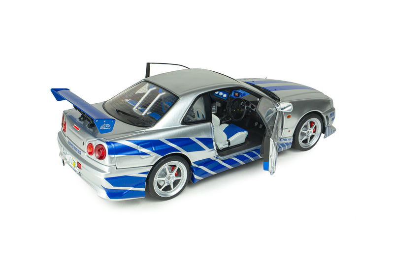 Load image into Gallery viewer, NISSAN SKYLINE GT-R (BNR34) 2FAST2FURIOUS BRIAN SOLIDO 1:18
