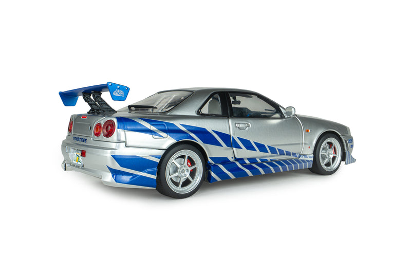 Load image into Gallery viewer, NISSAN SKYLINE GT-R (BNR34) 2FAST2FURIOUS BRIAN SOLIDO 1:18
