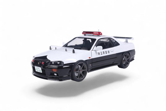 NISSAN SKYLINE GT-R (BNR34) BLANC POLICE JAPONAISE 1999 SOLIDO 1:18