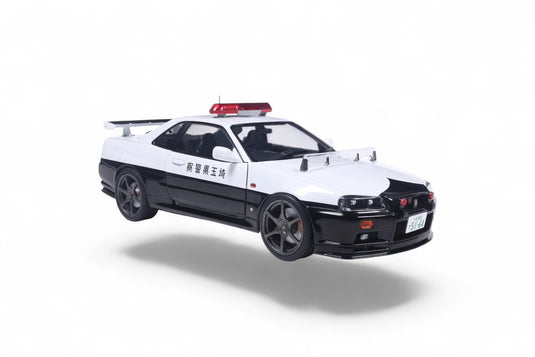 NISSAN SKYLINE GT-R (BNR34) BLANC POLICE JAPONAISE 1999 SOLIDO 1:18